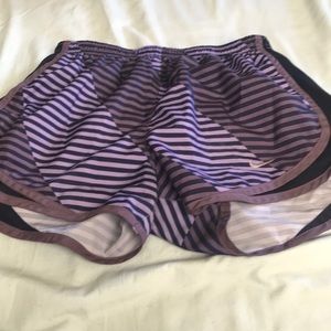 Woman’s purple Nike shorts!